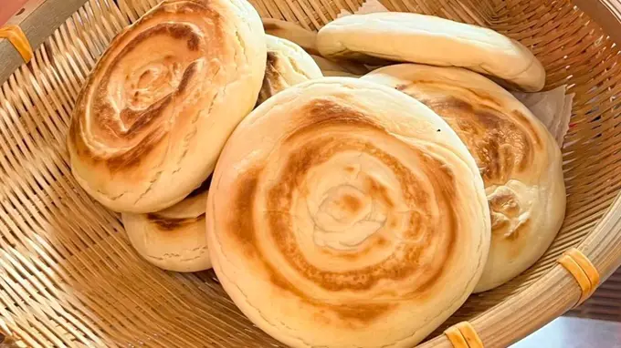 :白吉馍不撒芝麻的功能与口感考量