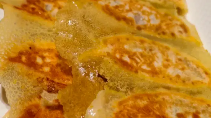 香辣酥脆锅贴：点亮日常的味蕾治愈