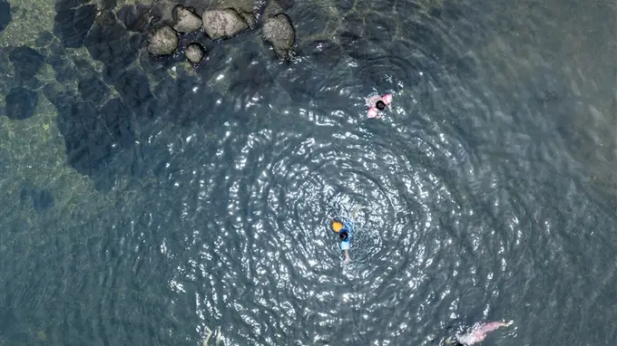 火山冷泉瀑声送凉 海口暑期避暑游升温