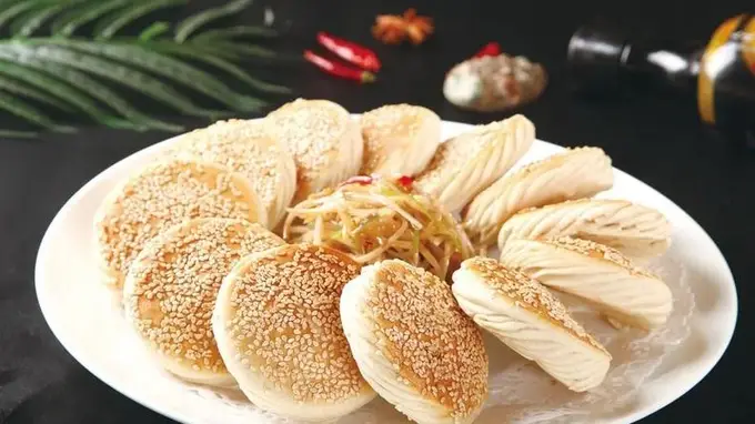 吕文扬:让高炉烧饼飘出八百年的炭香